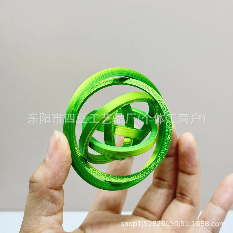 Jouet anti-stress rotatif imprimé 3D avec 6 anneaux.