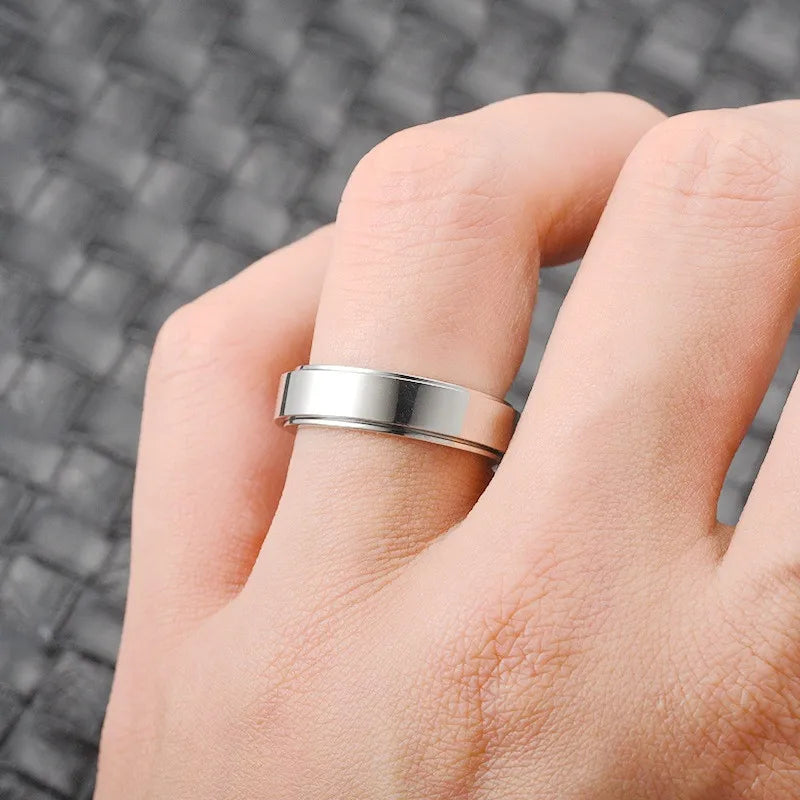Bague anti-stress en acier inoxydable pour homme et femme.