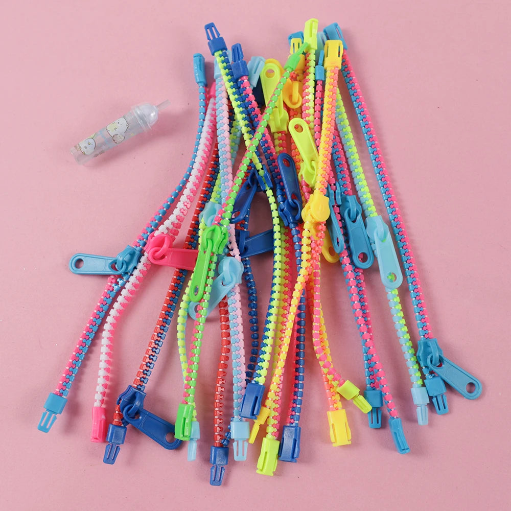 Bracelets anti-stress à fermeture éclair (15 pièces).