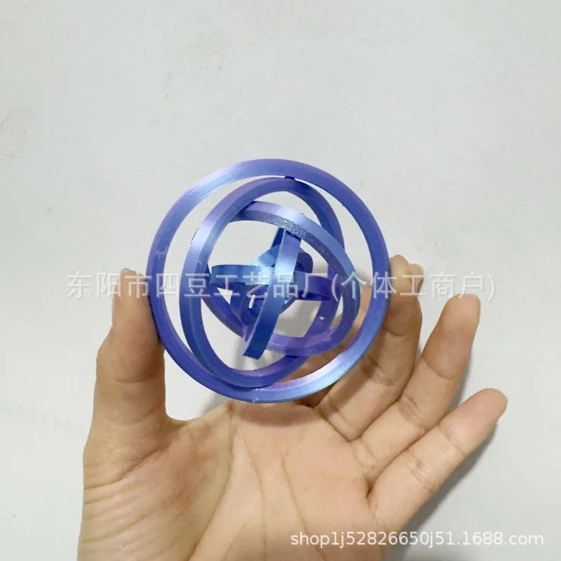 Jouet anti-stress rotatif imprimé 3D avec 6 anneaux.