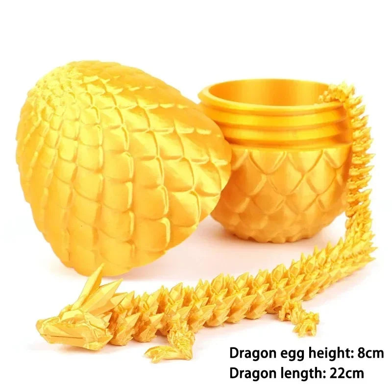 Dragon articulé et œuf imprimés en 3D.