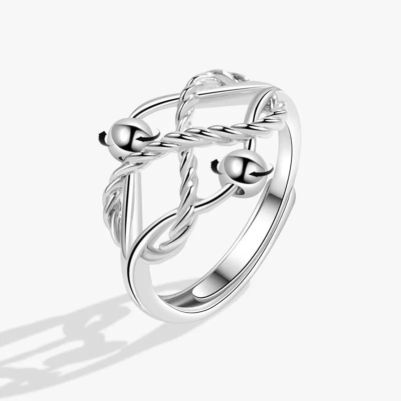 Bague anti-Stress pour femme avec perles rotatives.