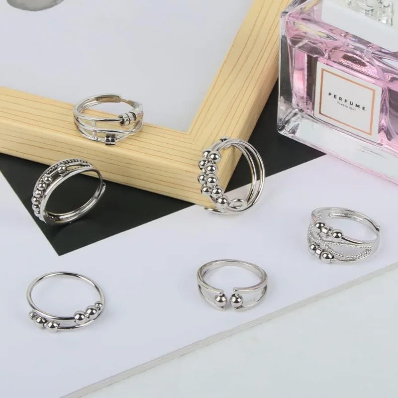 Bagues anti-stress en acier inoxydable pour femme (6 pièces).