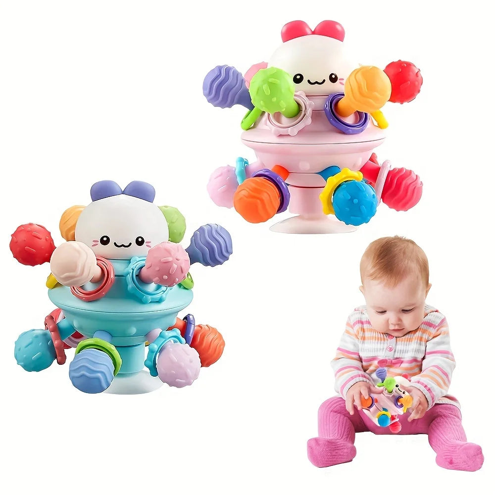 Balle de préhension  avec anneaux de dentition.