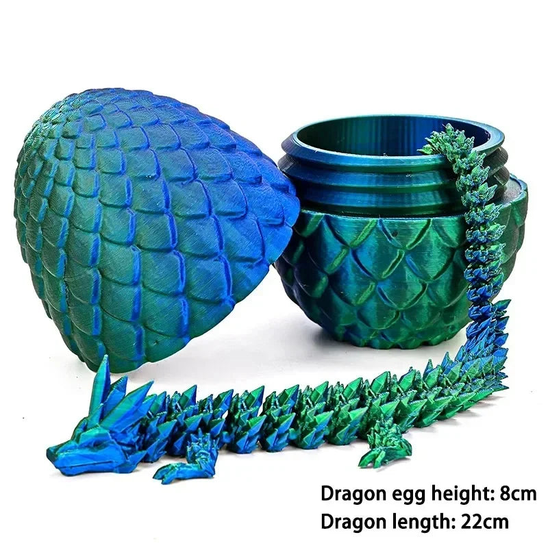 Dragon articulé et œuf imprimés en 3D.