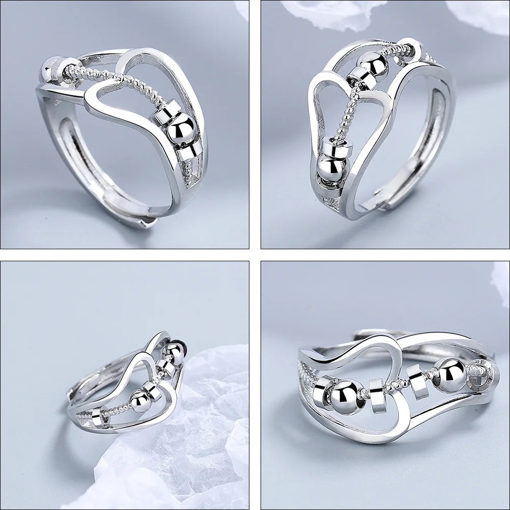 Bague anti-stress pour femme avec perles rotatives.