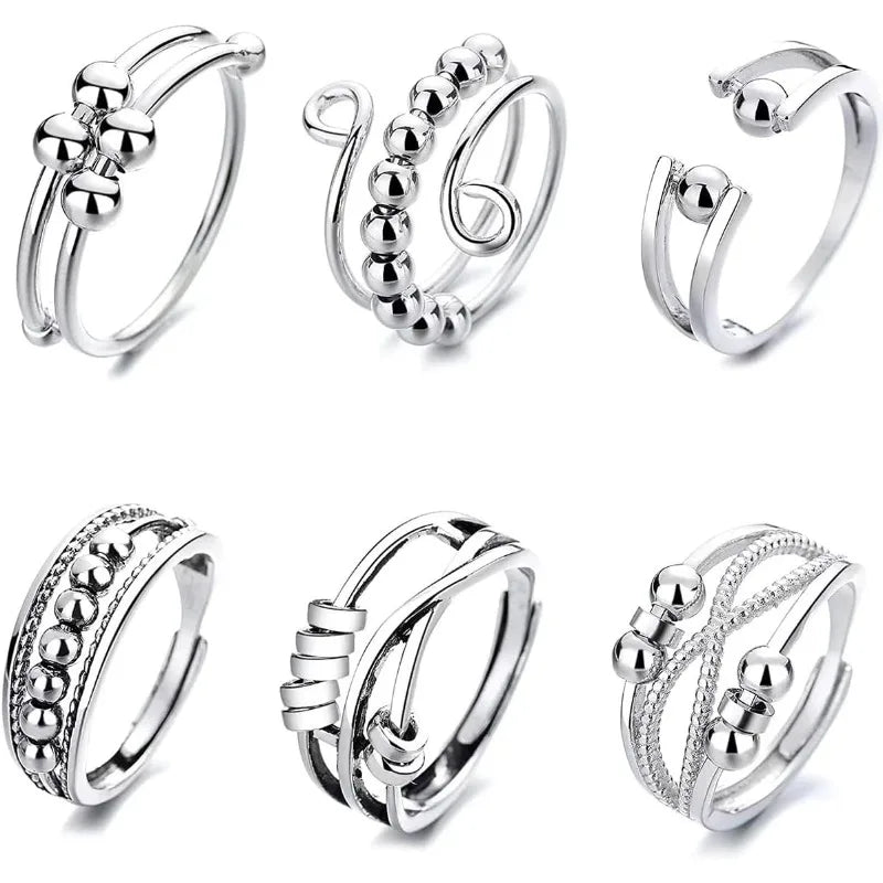 Bagues anti-stress en acier inoxydable pour femme (6 pièces).