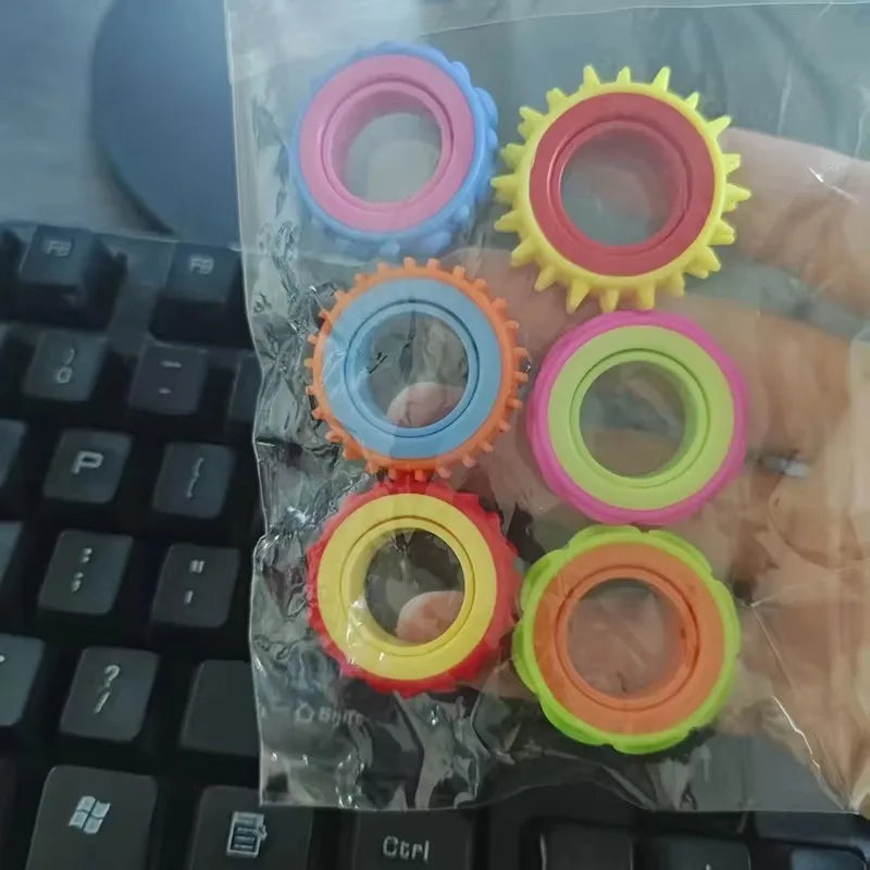 Bagues rotatives pour enfants, anneau sensoriel pour les doigts (6 pièces).