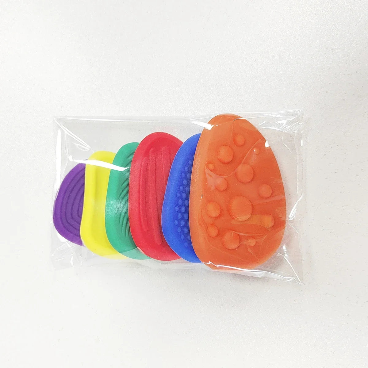 Pierres sensorielles en silicone, texturées (6 pièces).
