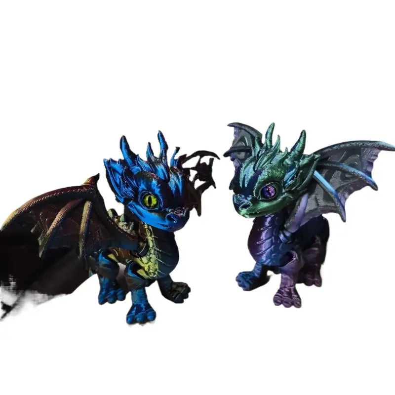 Dragon articulé imprimé en 3D avec ailes et queue rétractables.