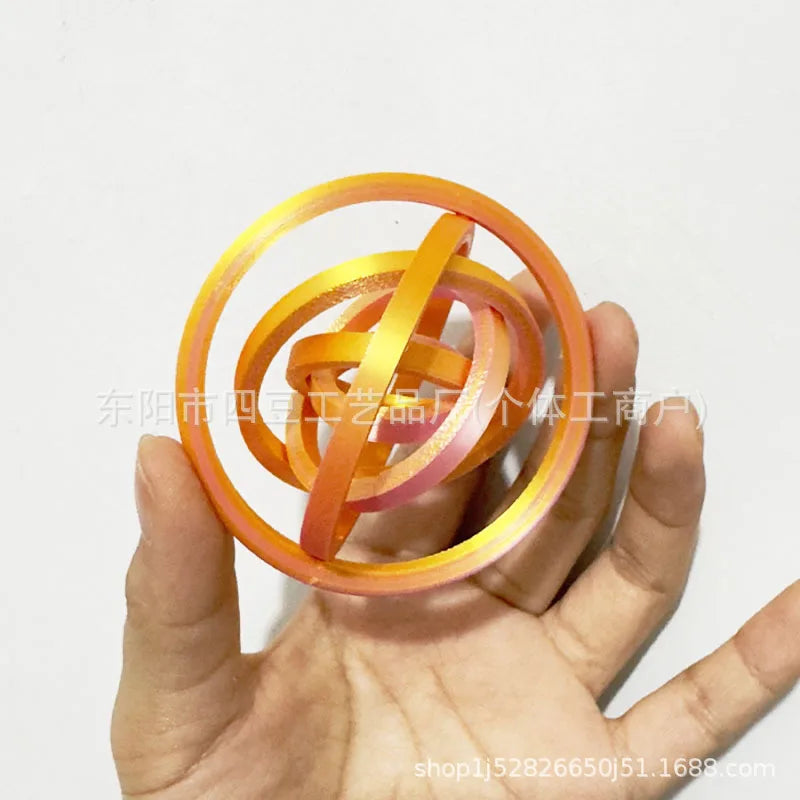 Jouet anti-stress rotatif imprimé 3D avec 6 anneaux.