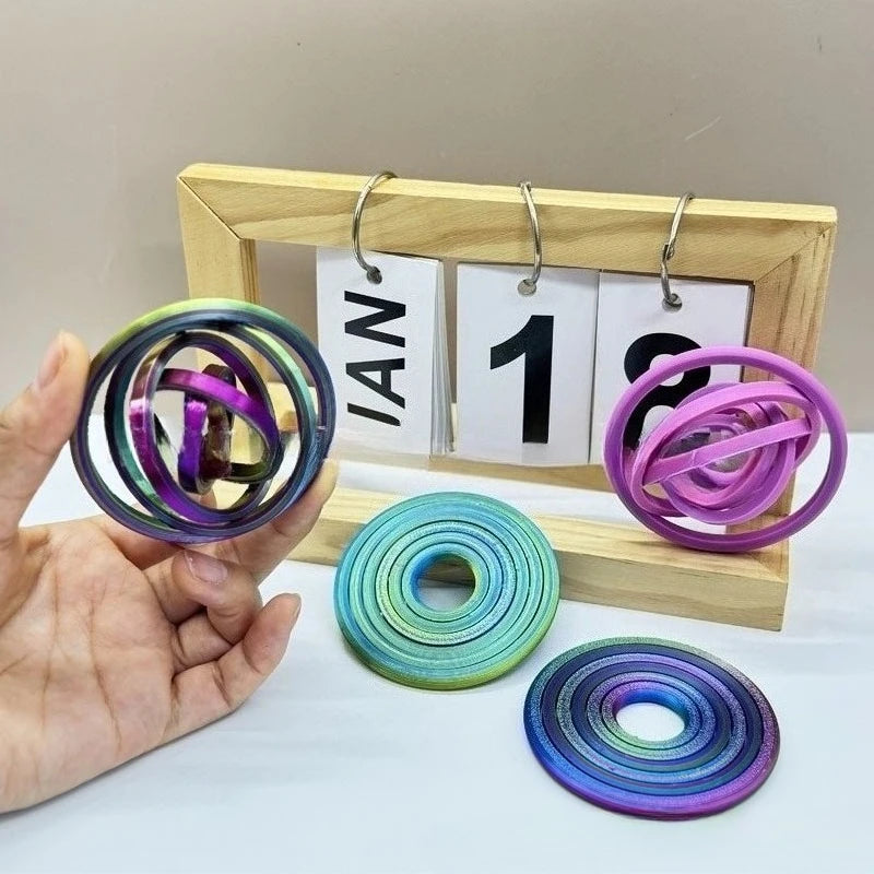 Jouet anti-stress rotatif imprimé 3D avec 6 anneaux.