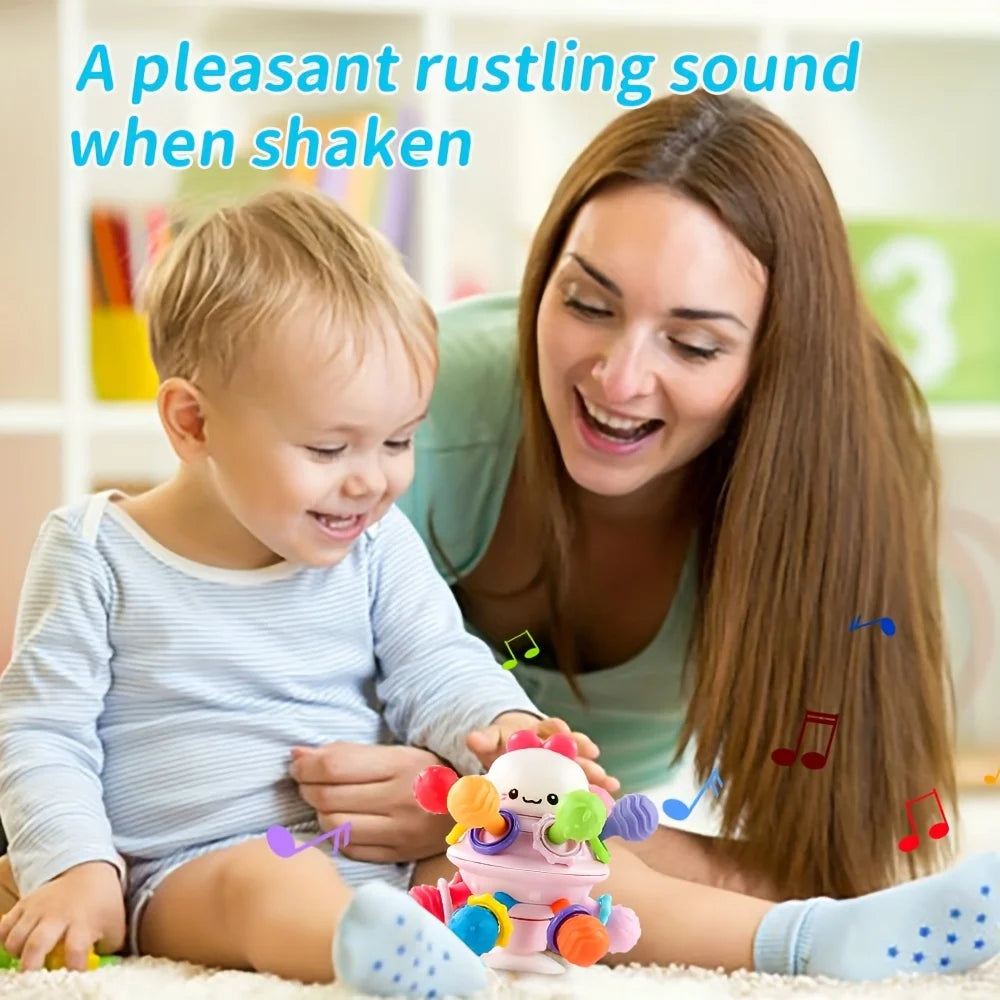 Balle de préhension  avec anneaux de dentition.