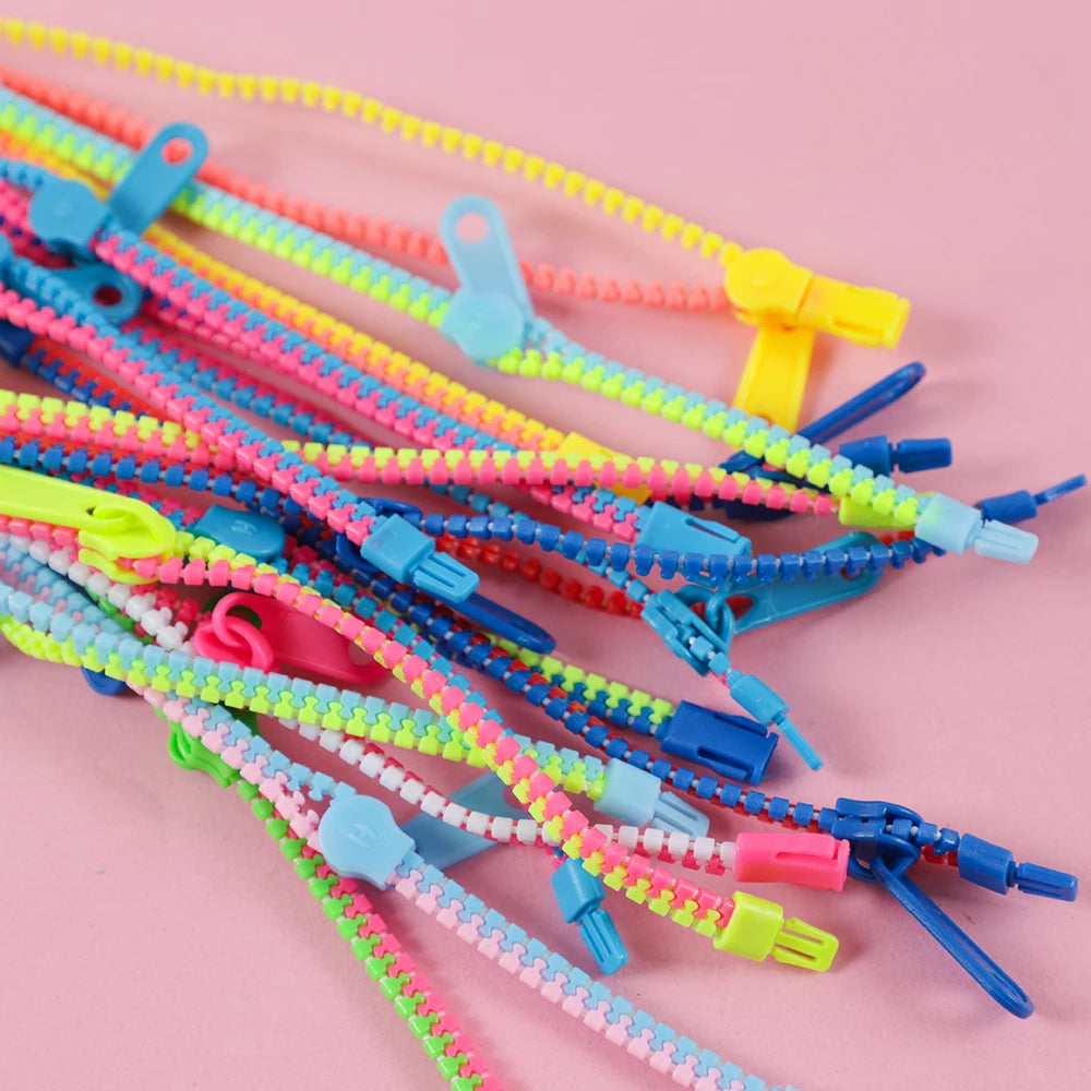 Bracelets anti-stress à fermeture éclair (15 pièces).