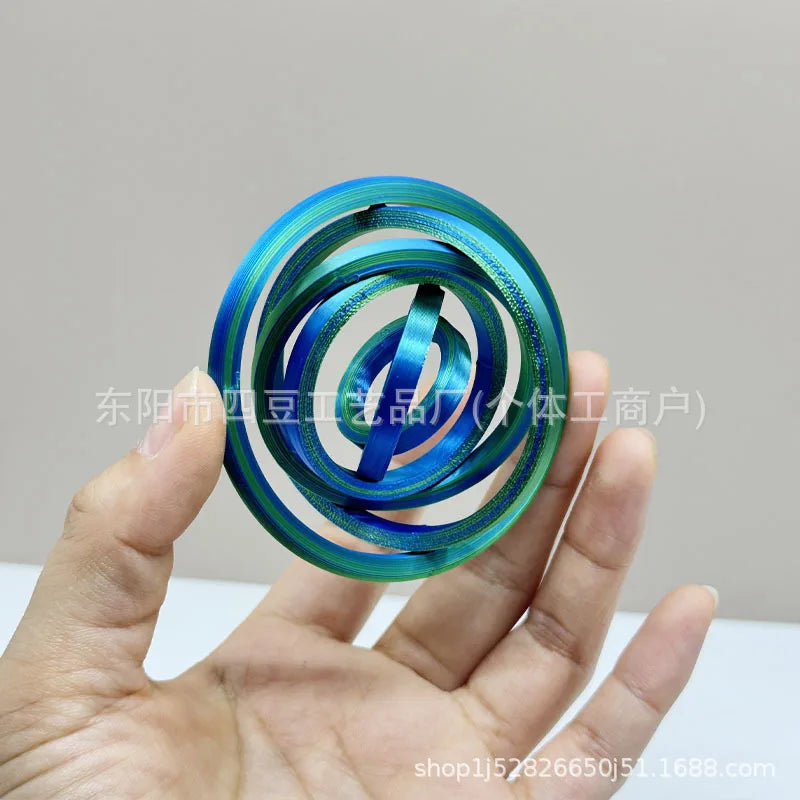 Jouet anti-stress rotatif imprimé 3D avec 6 anneaux.