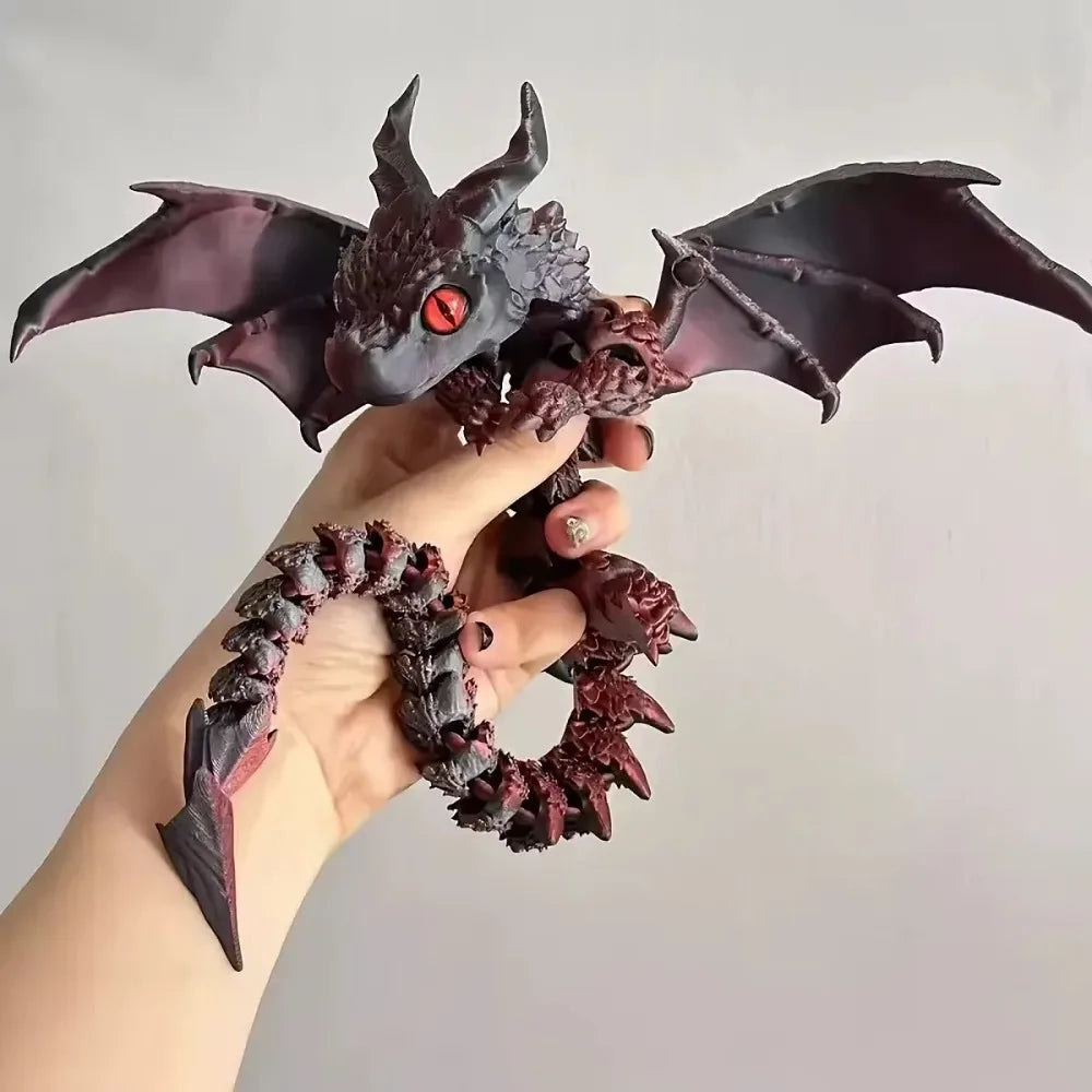 Dragon articulé avec aile mobile imprimé en 3D.
