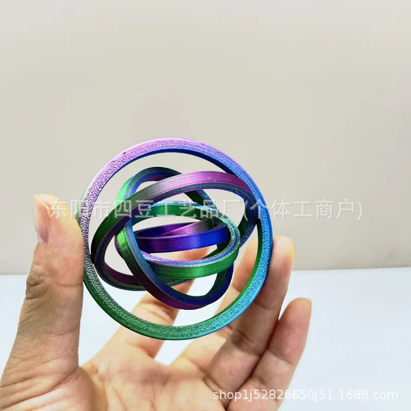 Jouet anti-stress rotatif imprimé 3D avec 6 anneaux.